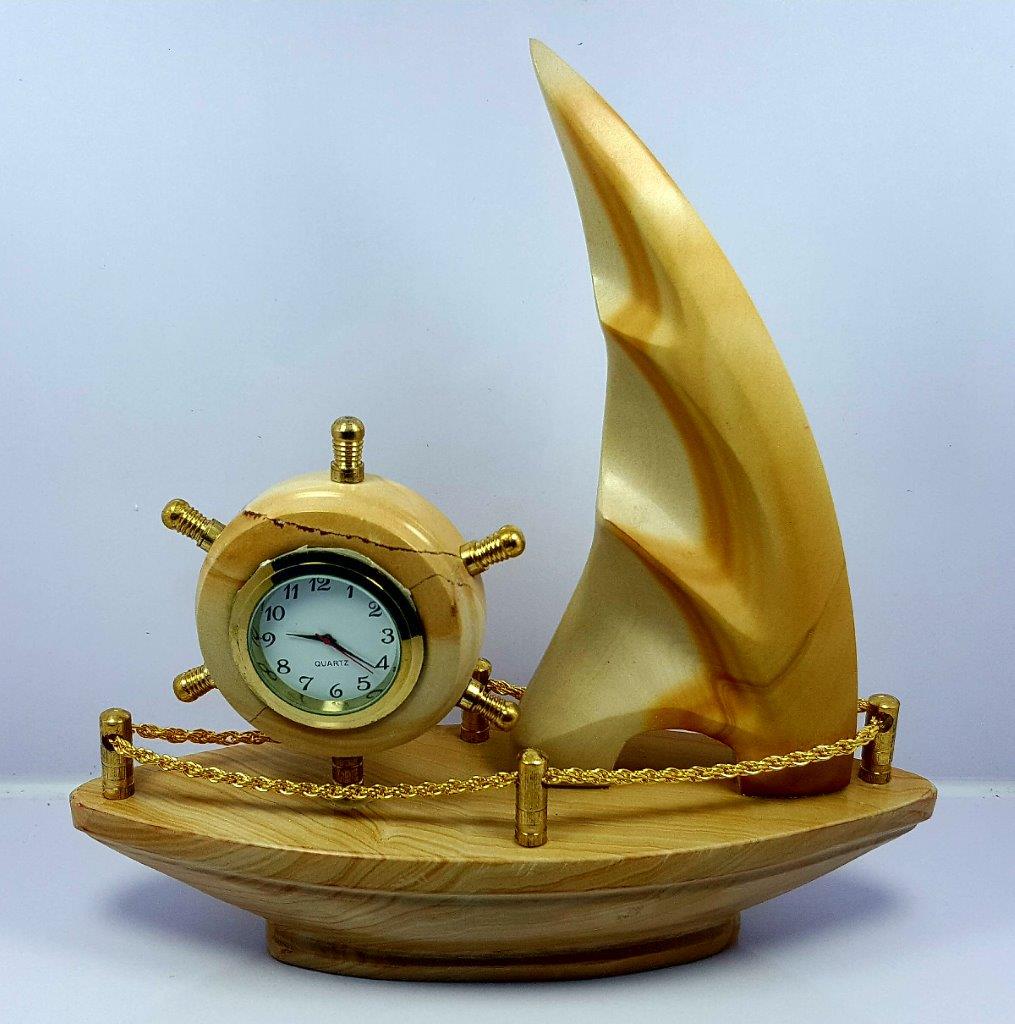 Wood Jasper Table Clock - 1077 Grams: Wood Jasper Table Clock - 1077 Grams - 208X205X65 mmShipping Rate: $80.00 .shipping rates are determined by Parcel weight and destination.Combined shipping: We offer combine shipping on multiple items