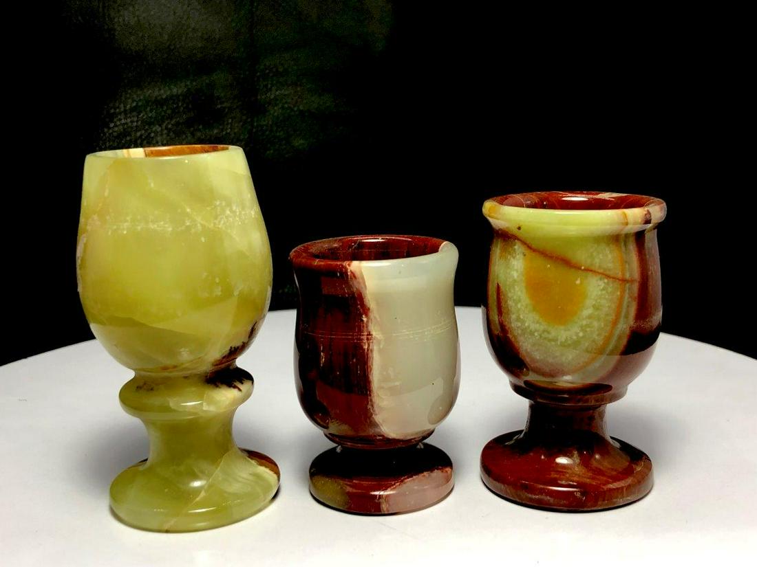Polished Onyx Mugs - 230 Grams: Polished Onyx Mugs - 230 GramsShipping Rate: $36.00 .shipping rates are determined by Parcel weight and destination.Combined shipping: We offer combine shipping on multiple items purchased to reduce s
