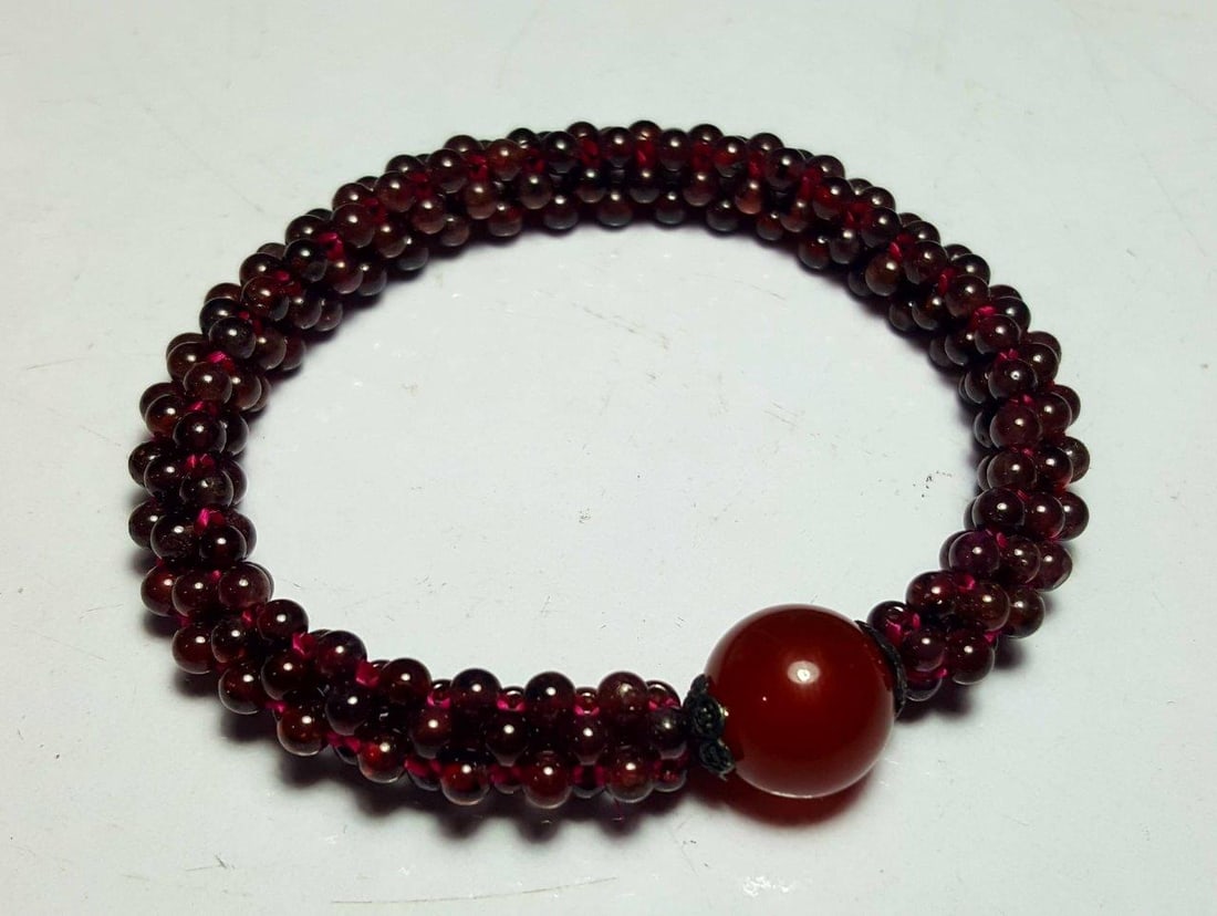 Garnet With Agate Bracelet: Garnet With Agate Bracelet Shipping: $23.00. Shipping rates are determined by Parcel weight and destination.