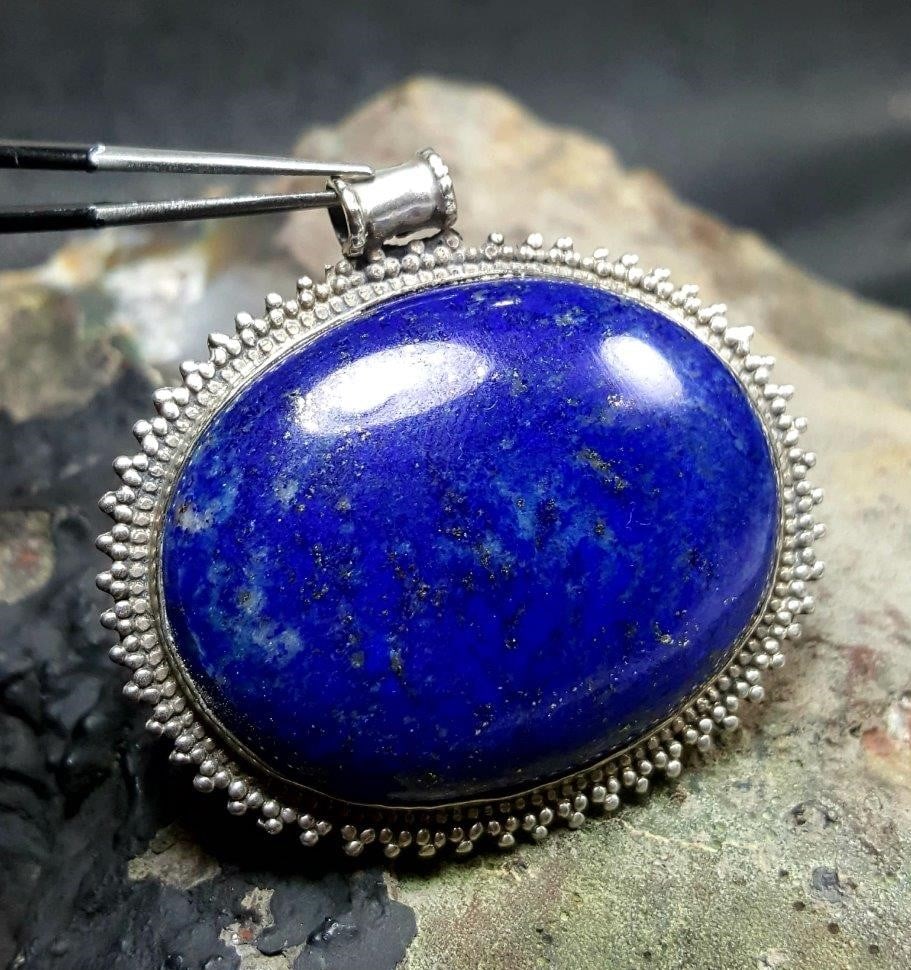 Egyptian Style Lapis Pendant: Egyptian Style Lapis Fashion Jewelry - 47X51X10 mmShipping Rate: $23.00 .shipping rates are determined by Parcel weight and destination.Combined shipping: We offer combine shipping on multiple items p