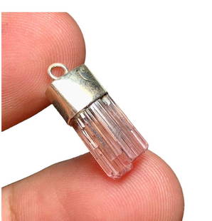 Pink Tourmaline Pendant in Silver: Pink Tourmaline Pendant in SilverShipping Rate: $23.00 .shipping rates are determined by Parcel weight and destination.Combined shipping: We offer combine shipping on multiple items purchased to reduc