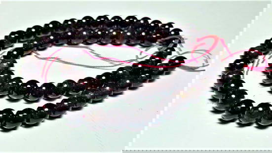 Polished Garnet Beaded Necklace: Polished Garnet Beaded Necklace Shipping: $23.00. Shipping rates are determined by Parcel weight and destination.