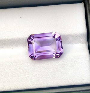 Emerald Cut Natural Ametrine - 7.20 Carats - 14X10X7 mm: Emerald Cut Natural Ametrine - 7.20 Carats - 14X10X7 mmShipping Rate: $15.00 .shipping rates are determined by Parcel weight and destination.Combined shipping: We offer combine shipping on multiple it