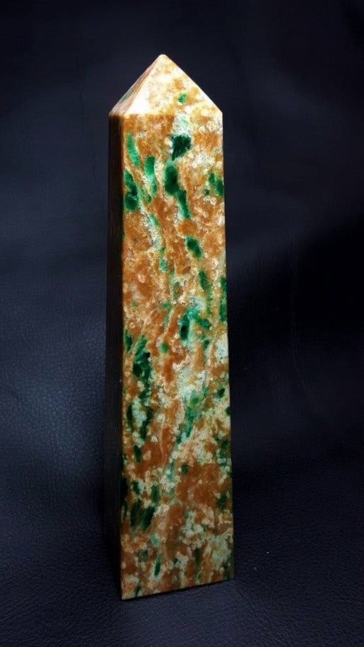 438 Grams Aventurine Polished Tower: 438 Grams Aventurine Polished Tower Shipping: $45.00. Shipping rates are determined by Parcel weight and destination.
