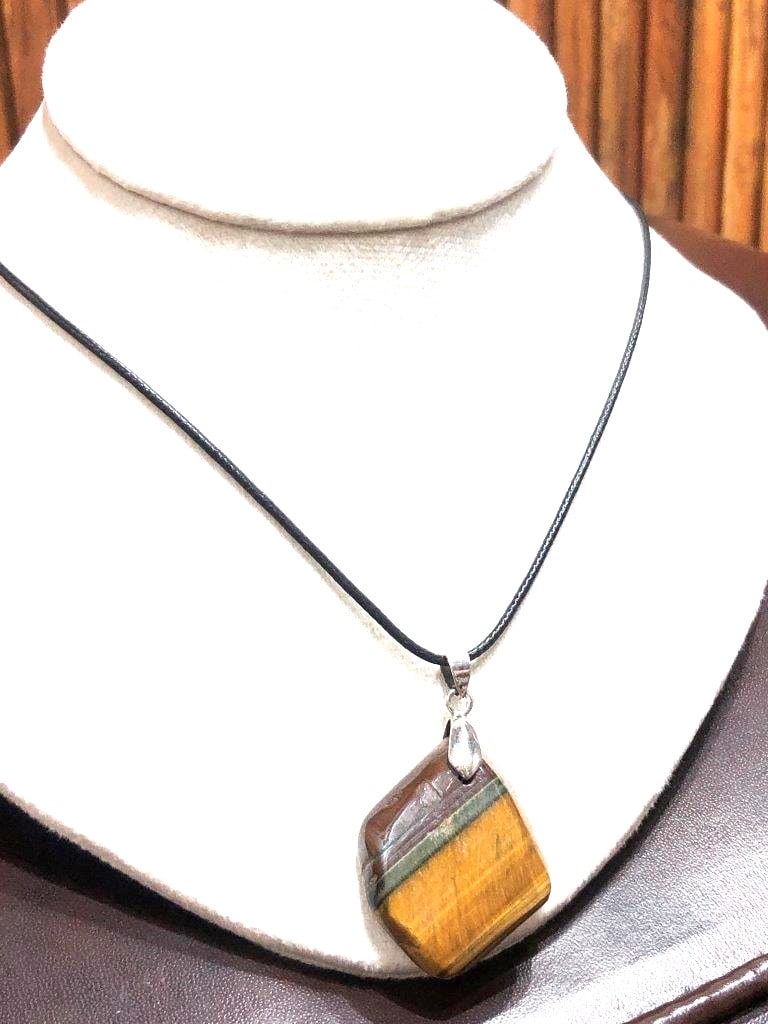Handmade Tiger Eye Healing Necklace: Handmade Tiger Eye Healing Necklace Shipping: $20.00. Shipping rates are determined by Parcel weight and destination.