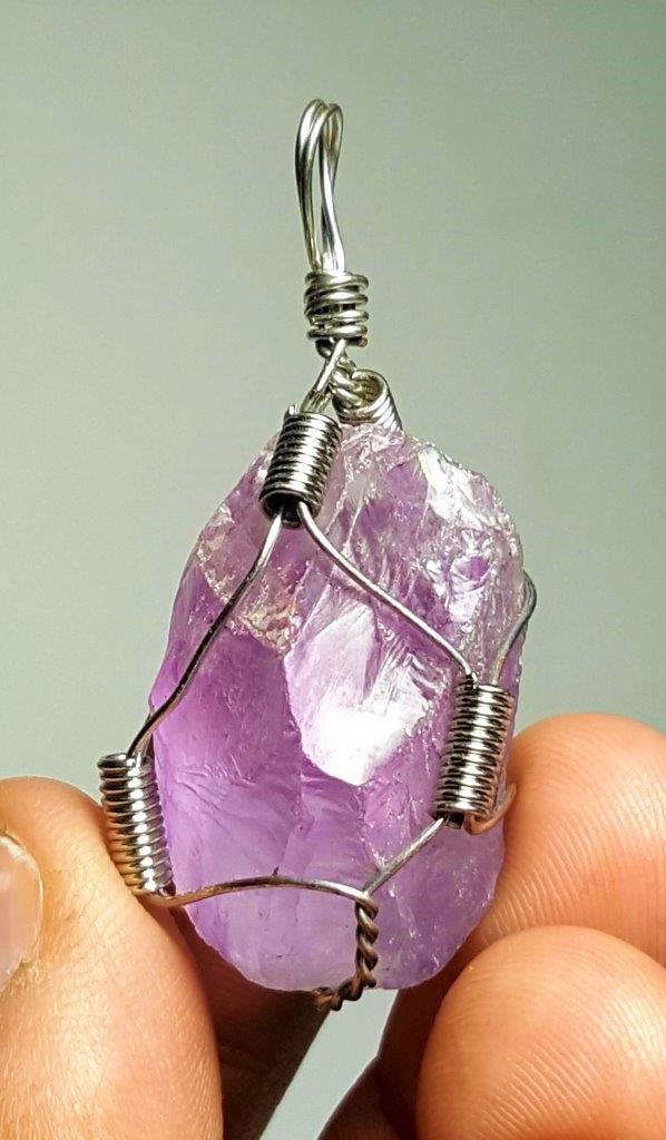 Wire Wrapped Rough Raw Crystal Charm Amethyst Pendant 28X22X16 mm: Wire Wrapped Rough Raw Crystal Charm Amethyst Pendant 28X22X16 mm Shipping: $36.00. Shipping rates are determined by Parcel weight and destination.