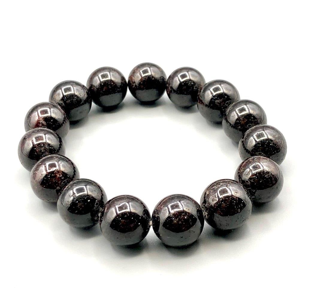 Garnet Charm Bracelet: Garnet Charm Bracelet Shipping: $23.00. Shipping rates are determined by Parcel weight and destination.