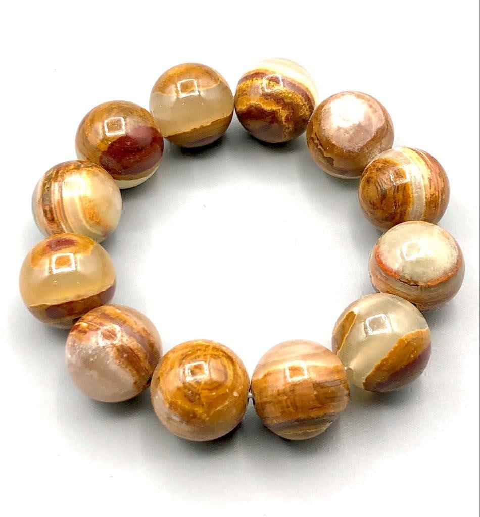 Mix Calcite Charm Bracelet: Mix Calcite Charm Bracelet Shipping: $25.00. Shipping rates are determined by Parcel weight and destination.