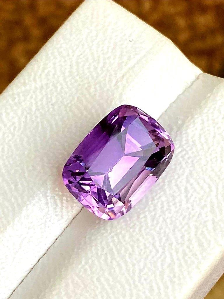 Cushion Cut Beautiful Amethyst Stone - 9.5 Carats: Cushion Cut Beautiful Amethyst Stone - 9.5 Carats - 14X10X10 mmShipping Rate: $15.00 .shipping rates are determined by Parcel weight and destination.Combined shipping: We offer combine shipping on mul