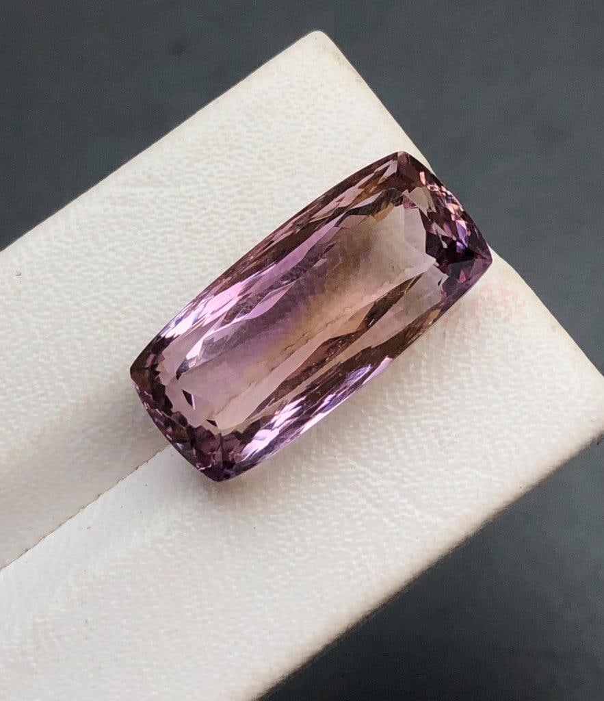 Flawless Ametrine Cutstone - 27 Carats: Flawless Ametrine Cutstone - 27 Carats - 26X12X11 mmShipping Rate: $15.00 .shipping rates are determined by Parcel weight and destination.Combined shipping: We offer combine shipping on multiple items