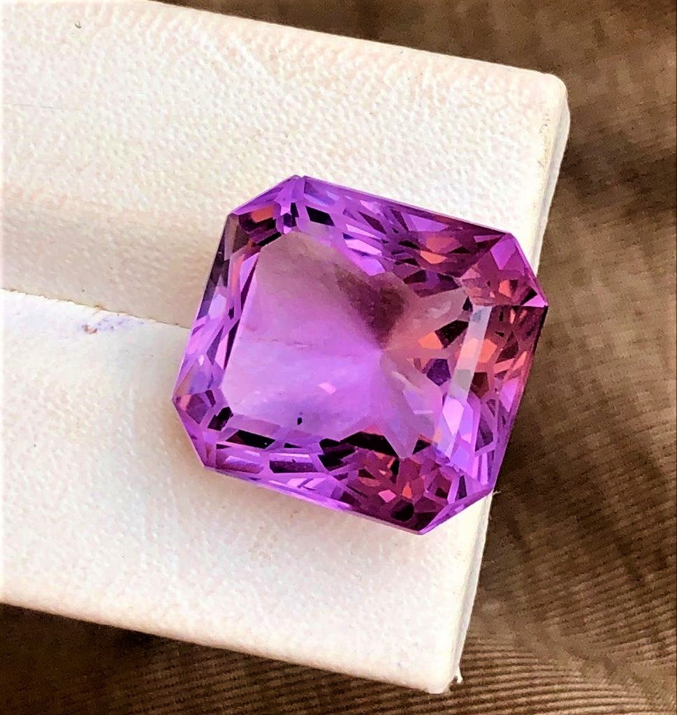 15.95 Carats Deep Purple Amethyst: 15.95 Carats Deep Purple Amethyst - 15X10 mmShipping Rate: $15.00 .shipping rates are determined by Parcel weight and destination.Combined shipping: We offer combine shipping on multiple items purchas