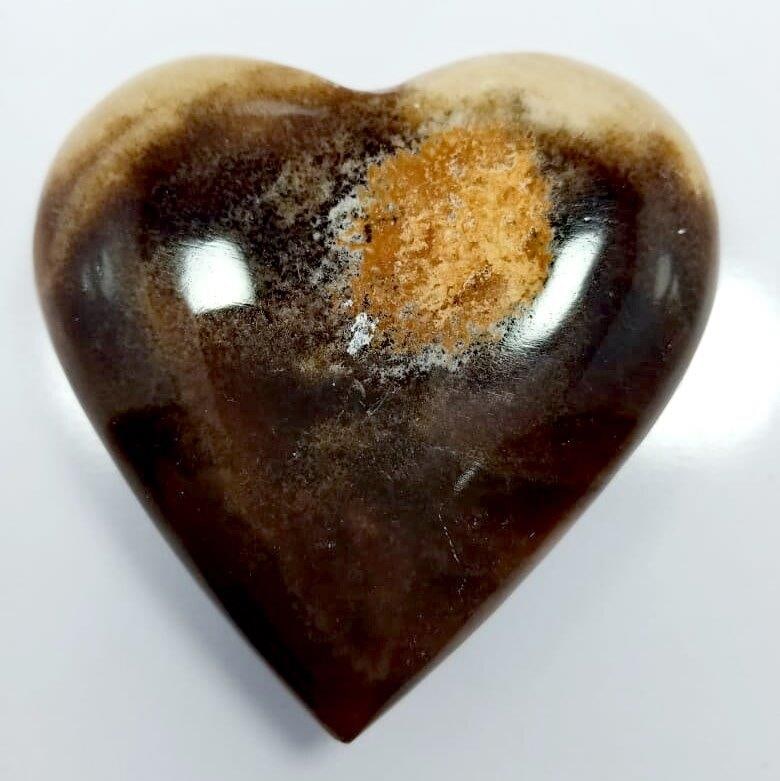Chocolate Calcite Heart Massager - 107.5 G: Chocolate Calcite Heart Massager - 64x64x19.5 mm - 107.5 GShipping Rate: $23.00 .shipping rates are determined by Parcel weight and destination.Combined shipping: We offer combine shipping on multiple