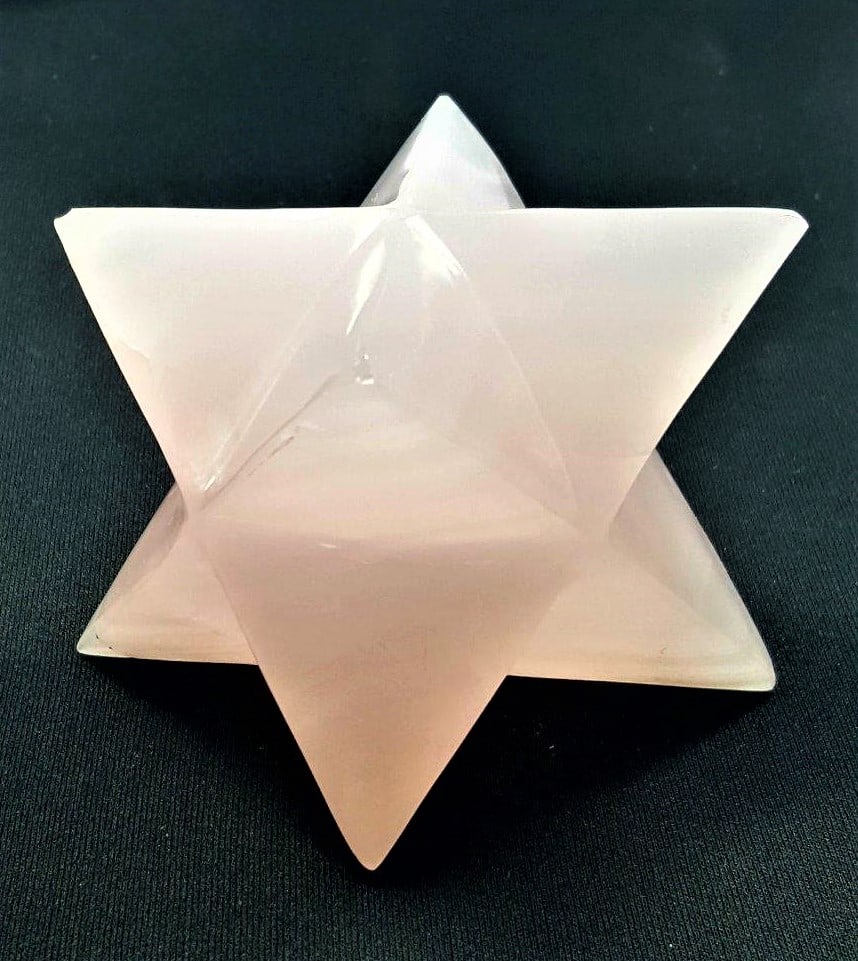 Beautifully Polished Pink Calcite Star - 444.6 Grams: Beautifully Polished Pink Calcite Star - 444.6 Grams - 67X67X64 mmShipping Rate: $45.00 .shipping rates are determined by Parcel weight and destination.Combined shipping: We offer combine shipping on