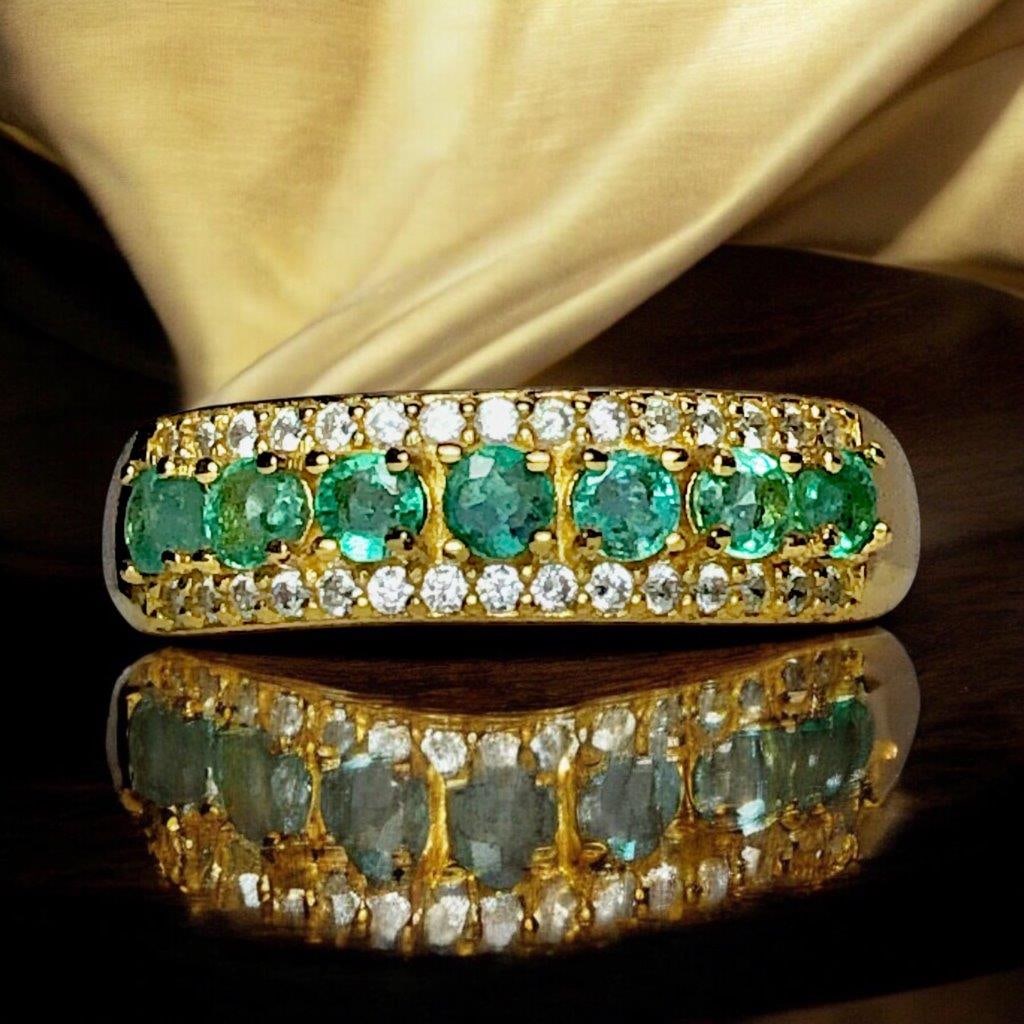 Emeral Ring Gold Plated - Ring Size 8 US: Emeral Ring Gold Plated - Ring Size 8 US Stone Weight: 0.70 CaratsRing Size: 8 US(Adjustable)Ring Weight: Zircons: 80 CentsMetal: Silver Choose design of your own and we will make it for youWe accept