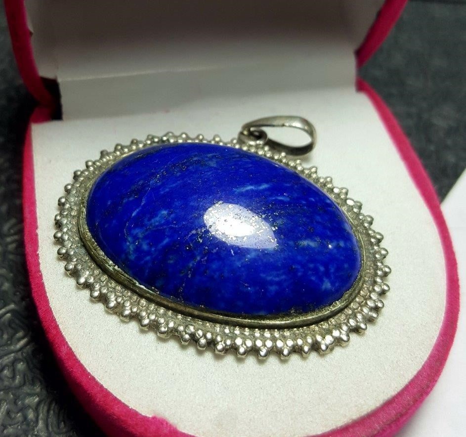 Blue Lapis Pendant: Blue Lapis Pendant - 33X42X9 mmShipping Rate: $23.00 .shipping rates are determined by Parcel weight and destination.Combined shipping: We offer combine shipping on multiple items purchased to reduce