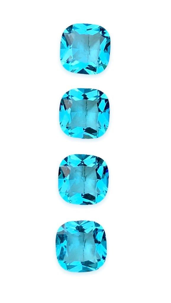 22.45 Carats Swiss Blue Topaz Lot - 12X12X7 mm: 22.45 Carats Swiss Blue Topaz Lot - 12X12X7 mm Shipping Rate: FREE SHIPPINGshipping rates are FREE WORLDWIDECombined shipping: We offer combine shipping on multiple items purchased to reduce shipping