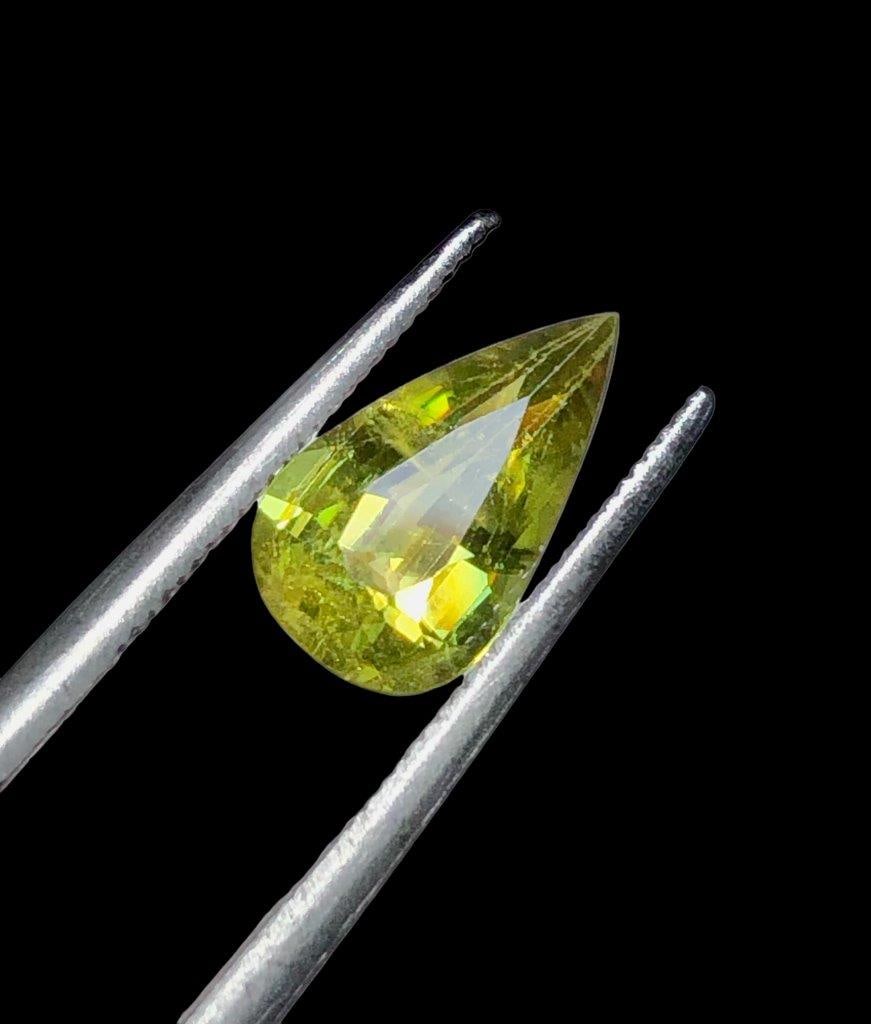 Natural Fire Sphene - 1.90 Carats - 11X6X4 mm: Natural Fire Sphene - 1.90 Carats - 11X6X4 mmShipping Rate: $15.00 .shipping rates are determined by Parcel weight and destination.Combined shipping: We offer combine shipping on multiple items purcha