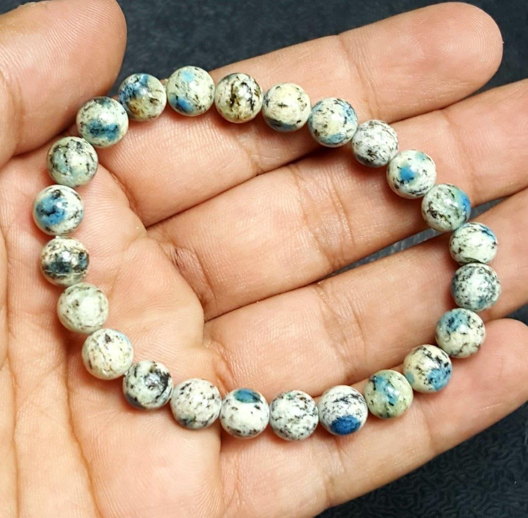 Ketonite Azurite in Granite Genuine Beaded Bracelet: Ketonite Azurite in Granite Genuine Beaded Bracelet Shipping: $23.00. Shipping rates are determined by Parcel weight and destination.