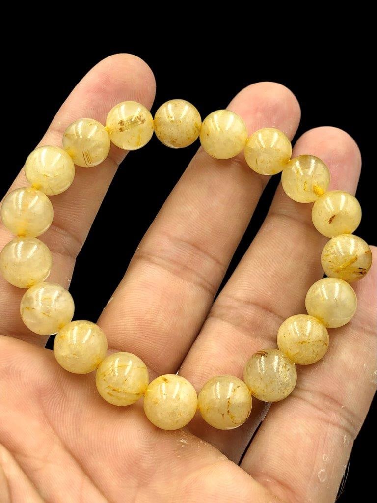 Yellow Calcite Beaded Charm Bracelet: Yellow Calcite Beaded Charm Bracelet Shipping: $23.00. Shipping rates are determined by Parcel weight and destination.