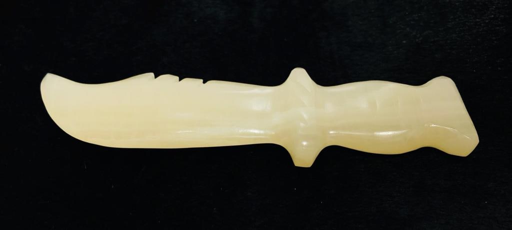 Honey calcite Knife - 76.9G: Honey calcite Knife - 137X28mm - 76.9G Shipping: $23.00. Shipping rates are determined by Parcel weight and destination.