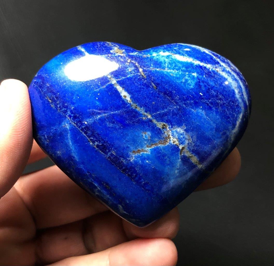 Polished Lapis Heart With Pyrite: Polished Lapis Heart With Pyrite Shipping: $23.00. Shipping rates are determined by Parcel weight and destination.