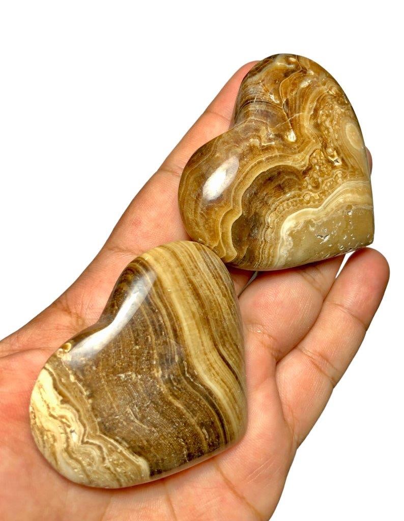 Chocolate crystal Paired hearts 120 Grams: Chocolate crystal Paired hearts 120 Grams Shipping: $23.00. Shipping rates are determined by Parcel weight and destination.