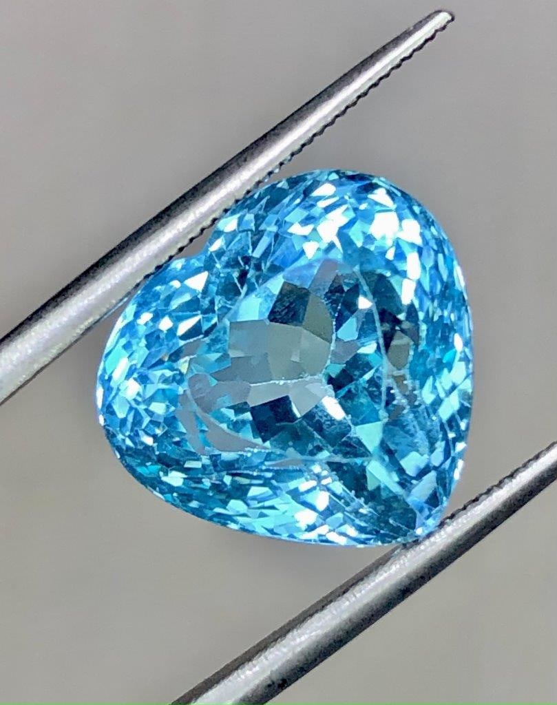 15.75 Carats Heart Shape Swiss Blue Topaz Gemstone - 15X13X12 mm: 15.75 Carats Heart Shape Swiss Blue Topaz Gemstone - 15X13X12 mm Choose design of your own and we will make it for youWe accept custom order in Sterling Silver, Gold and Platinum in WholeSale PriceCol