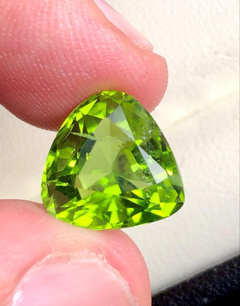 7.25 Carats Amazing Trillion Cut Natural Lustrous Peridot Gemstone - 12.5X12.5X8 mm: 7.25 Carats Amazing Trillion Cut Natural Lustrous Peridot Gemstone - 12.5X12.5X8 mm Choose design of your own and we will make it for youWe accept custom order in Sterling Silver, Gold and Platinum in