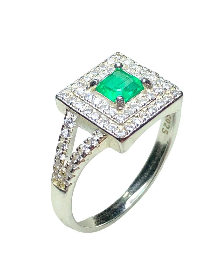 Natural Emerald Ring With Zircons In 925 Silver: Natural Emerald Ring With Zircons In 925 Silver FREE SHIPPING Shipping rates are determined by Parcel weight and destination.
