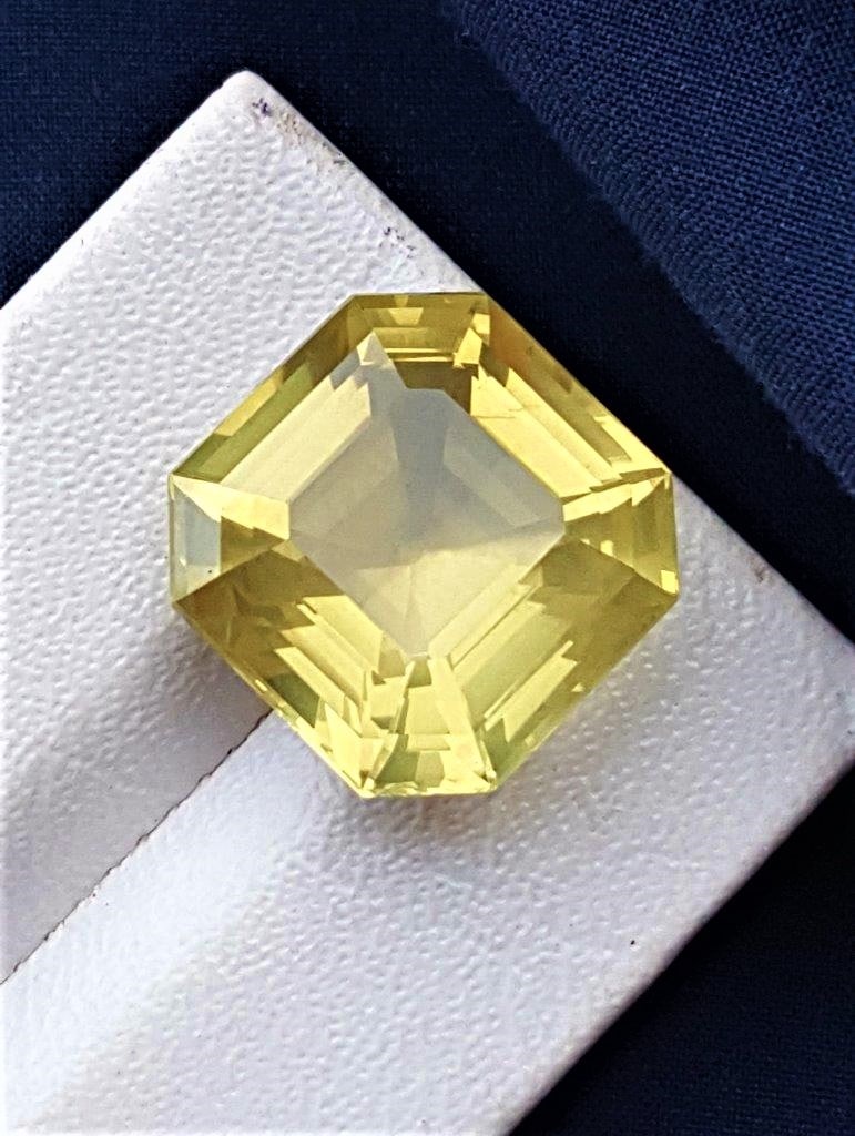 Asscher Cut Lemon Quartz Jewelry Size - 20.90 Carats: Asscher Cut Lemon Quartz Jewelry Size - 20.90 CaratsShipping Rate: $15.00 .shipping rates are determined by Parcel weight and destination.Combined shipping: We offer combine shipping on multiple items