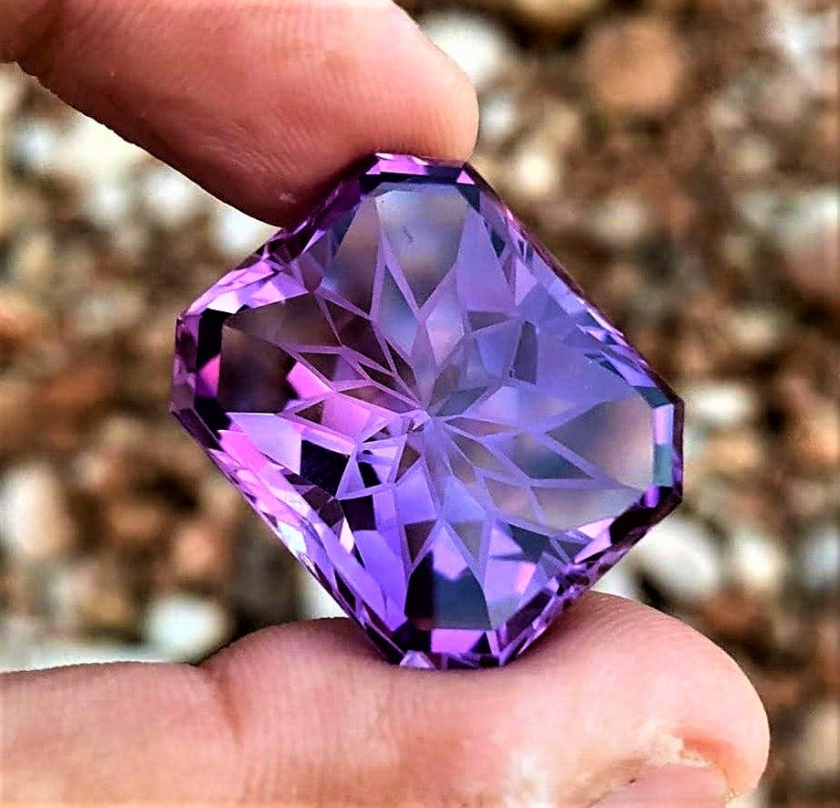 Flower Cut Flawless Amethyst - 58.45 Carats: Flower Cut Flawless Amethyst - 58.45 Carats - 26X22X16 mmShipping Rate: $15.00 .shipping rates are determined by Parcel weight and destination.Combined shipping: We offer combine shipping on multiple