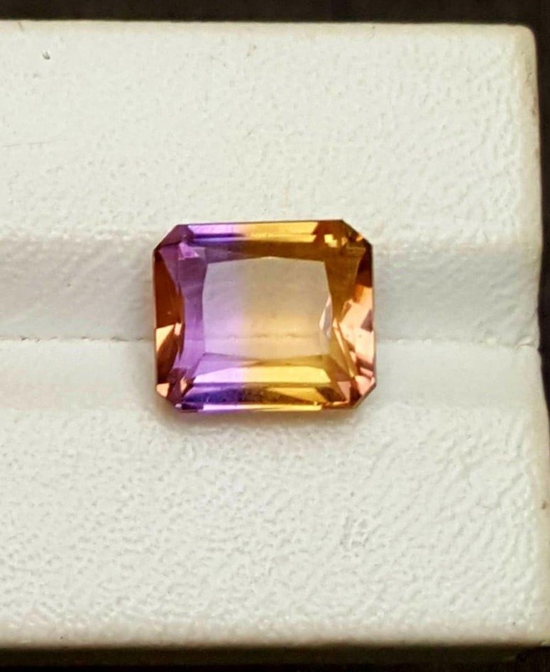 Ametrine AAA Quality - 8.5 Carats: Ametrine AAA Quality - 8.5 Carats - 13X11X7 mmShipping Rate: $15.00 .shipping rates are determined by Parcel weight and destination.Combined shipping: We offer combine shipping on multiple items purch