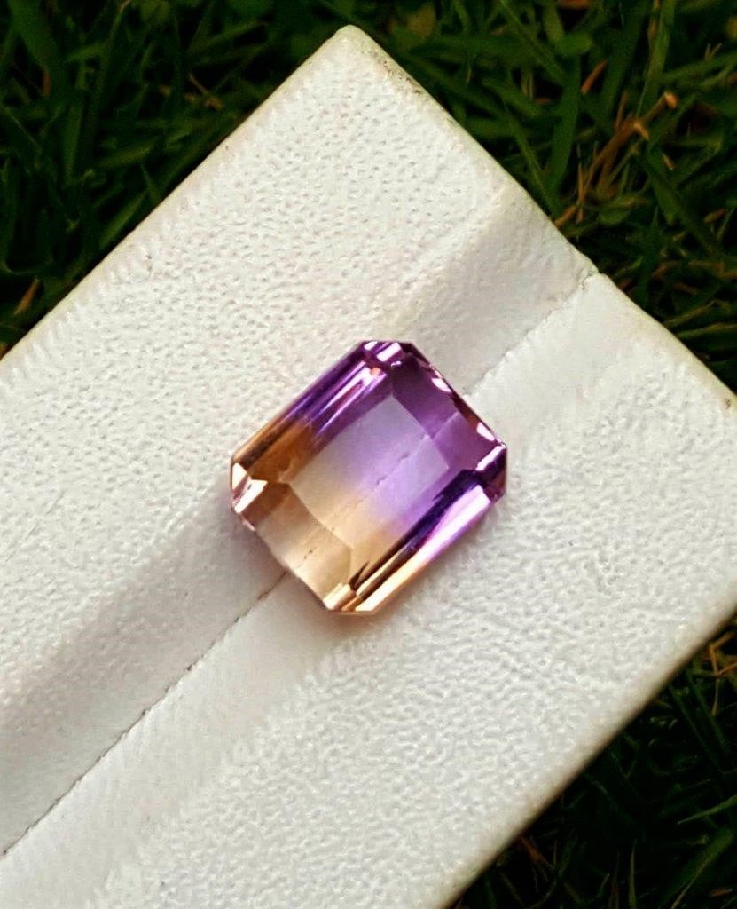 Ametrine Stone Bangkok Cutting - 10 Carats: Ametrine Stone Bangkok Cutting - 10 Carats - 12X12X9 mmShipping Rate: $15.00 .shipping rates are determined by Parcel weight and destination.Combined shipping: We offer combine shipping on multiple it