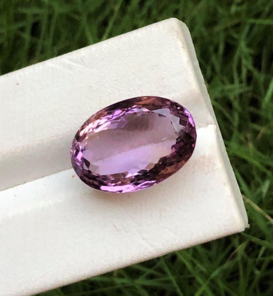 20.95 Carats Oval Ametrine: 20.95 Carats Oval Ametrine - 21X15X10 mmShipping Rate: $15.00 .shipping rates are determined by Parcel weight and destination.Combined shipping: We offer combine shipping on multiple items purchased t
