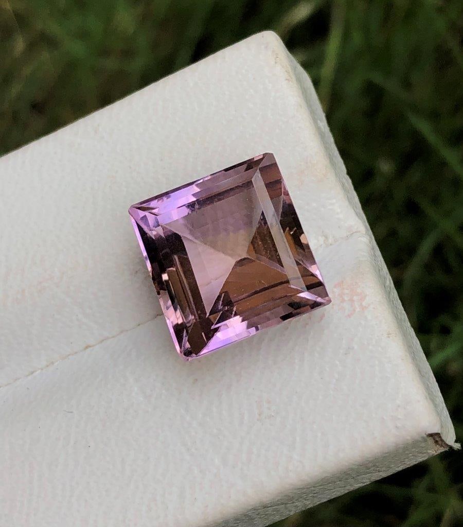 11 crts Square Shape Ametrine: 11 crts Square Shape Ametrine - 14X13X9 mmShipping Rate: $15.00 .shipping rates are determined by Parcel weight and destination.Combined shipping: We offer combine shipping on multiple items purchased