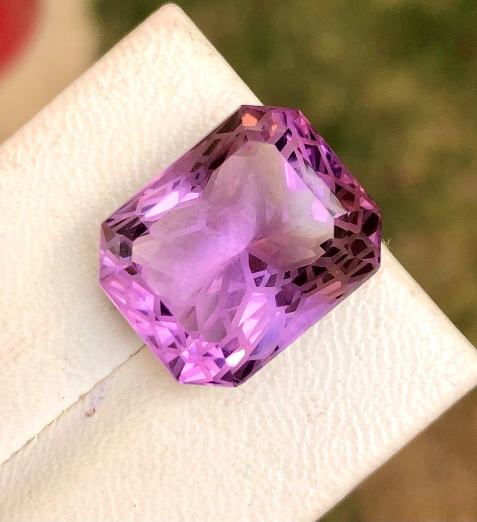 AAA Flower Cut Natural Amethyst - 54.35 Carats: AAA Flower Cut Natural Amethyst - 54.35 Carats - 23.5X20X17 mmShipping Rate: $15.00 .shipping rates are determined by Parcel weight and destination.Combined shipping: We offer combine shipping on mult