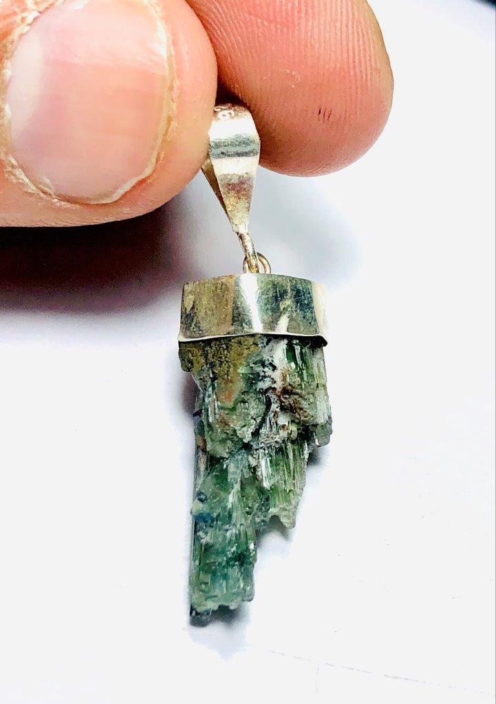 Green Tourmaline Crystals Cluster Pendant in SIlver: Green Tourmaline Crystals Cluster Pendant in SIlverShipping Rate: $23.00 .shipping rates are determined by Parcel weight and destination.Combined shipping: We offer combine shipping on multiple items