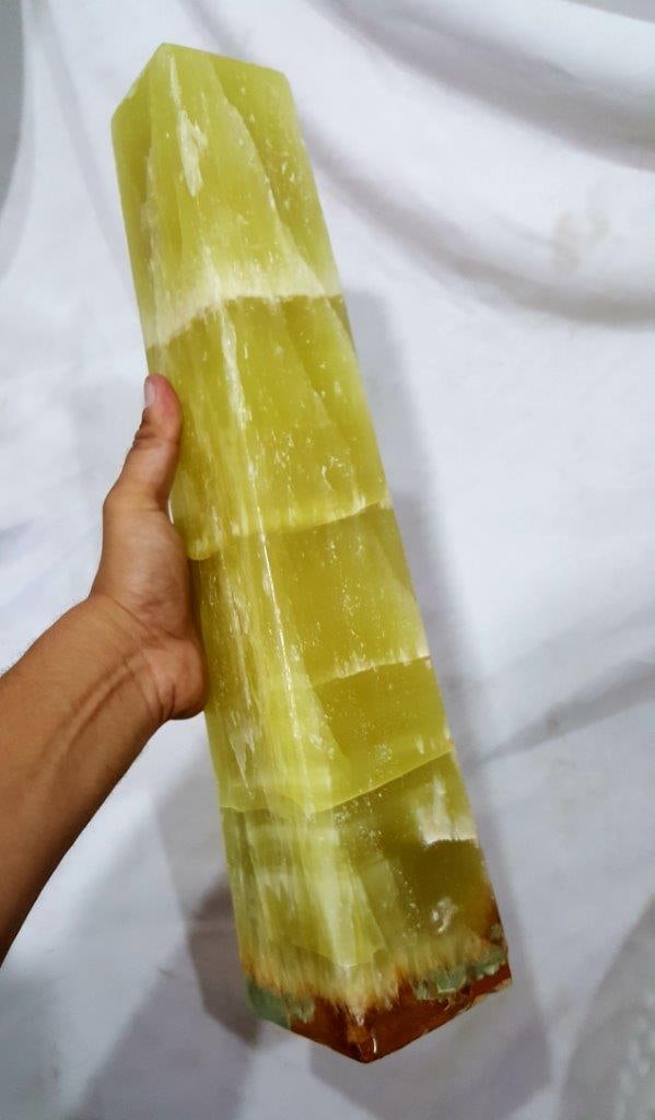 Huge Banded Calcite Tower - 7.18 KG: Huge Banded Calcite Tower - 7.18 KGShipping Rate: $150.00 .shipping rates are determined by Parcel weight and destination.Combined shipping: We offer combine shipping on multiple items purchased to