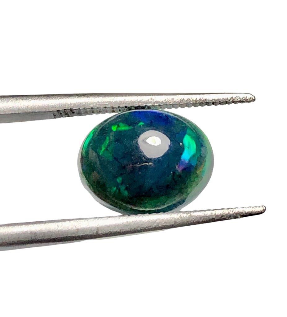 1.90 Carats Black Opal With Fire - 9X7X6 mm: 1.90 Carats Black Opal With Fire - 9X7X6 mmShipping Rate: $15.00 .shipping rates are determined by Parcel weight and destination.Combined shipping: We offer combine shipping on multiple items purchase