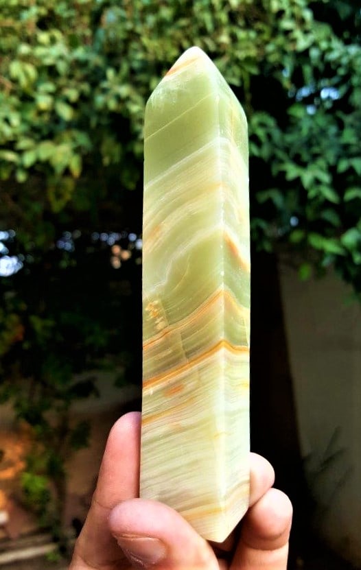 Natural Greenish Onix Tower - 250 Grams: Natural Greenish Onix Tower - 250 Grams Shipping: $36.00. Shipping rates are determined by Parcel weight and destination.