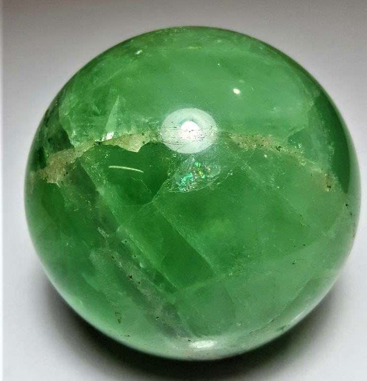 Deep Green Fluorite Healing Sphere - 1209 Grams: Deep Green Fluorite Healing Sphere - 1209 GramsShipping Rate: $70.00 .shipping rates are determined by Parcel weight and destination.Combined shipping: We offer combine shipping on multiple items