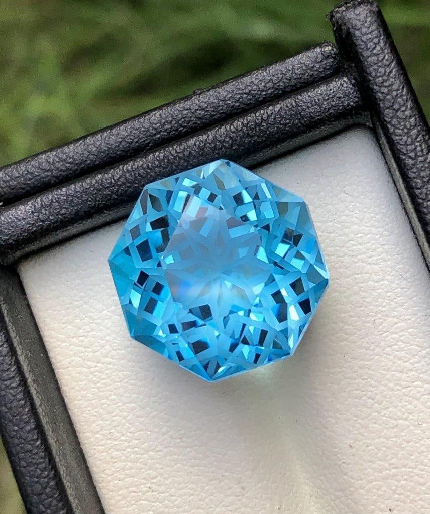 Perfect Flower Cut Swiss Blue Topaz - 28.55 Carats - 17X17X13 mm: Perfect Flower Cut Swiss Blue Topaz - 28.55 Carats - 17X17X13 mm Shipping Rate: $15.00 .shipping rates are determined by Parcel weight and destination.Combined shipping: We offer combine shipping on m