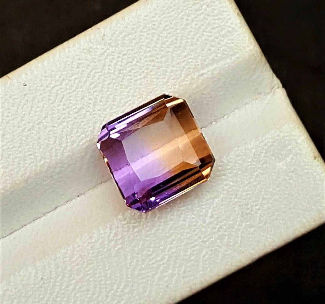 Emerald Cut Natural Ametrine - 10.5 Carats: Emerald Cut Natural Ametrine - 10.5 Carats - 13X12X9 mmShipping Rate: $15.00 .shipping rates are determined by Parcel weight and destination.Combined shipping: We offer combine shipping on multiple it