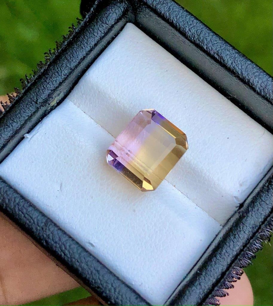 6.85 Carats Bi Color Ametrine - 11X9X8 mm: 6.85 Carats Bi Color Ametrine - 11X9X8 mmShipping Rate: $15.00 .shipping rates are determined by Parcel weight and destination.Combined shipping: We offer combine shipping on multiple items purchased