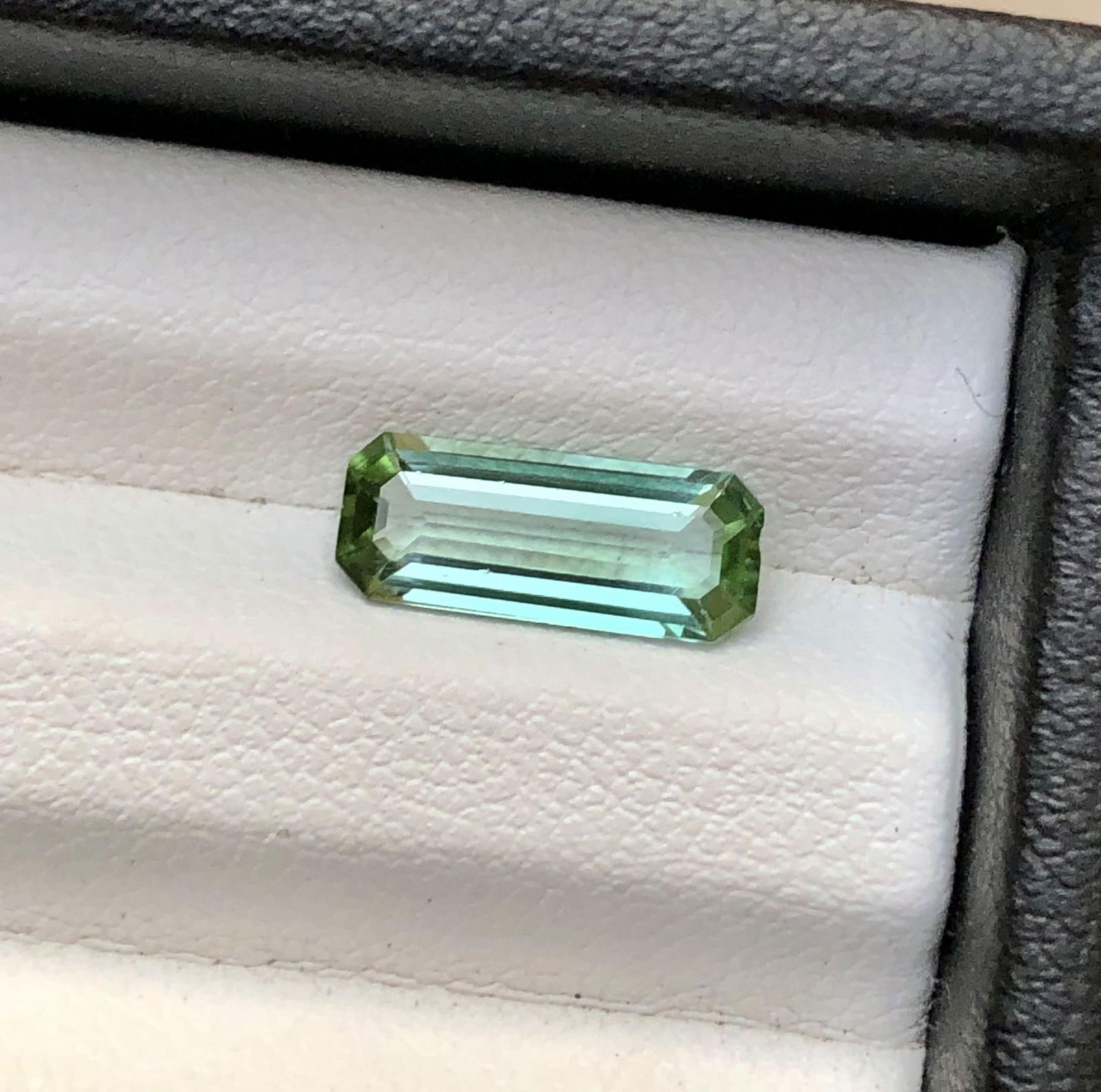 Emerald Cut Natural Bi Colour Ligth Green Tourmaline - 1.60 Carats - 13X5X3 mm: Emerald Cut Natural Bi Colour Ligth Green Tourmaline - 1.60 Carats - 13X5X3 mmShipping Rate: $15.00 .shipping rates are determined by Parcel weight and destination.Combined shipping: We offer combine
