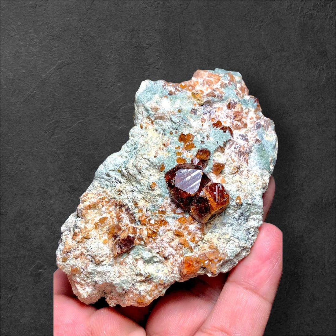 Natural Hessonite Garnet Cluster on Matrix - 146 Grams - 90X47X47 mm: Natural Hessonite Garnet Cluster on Matrix - 146 Grams - 90X47X47 mmShipping Rate: $30.00 .shipping rates are determined by Parcel weight and destination.Combined shipping: We offer combine shipping