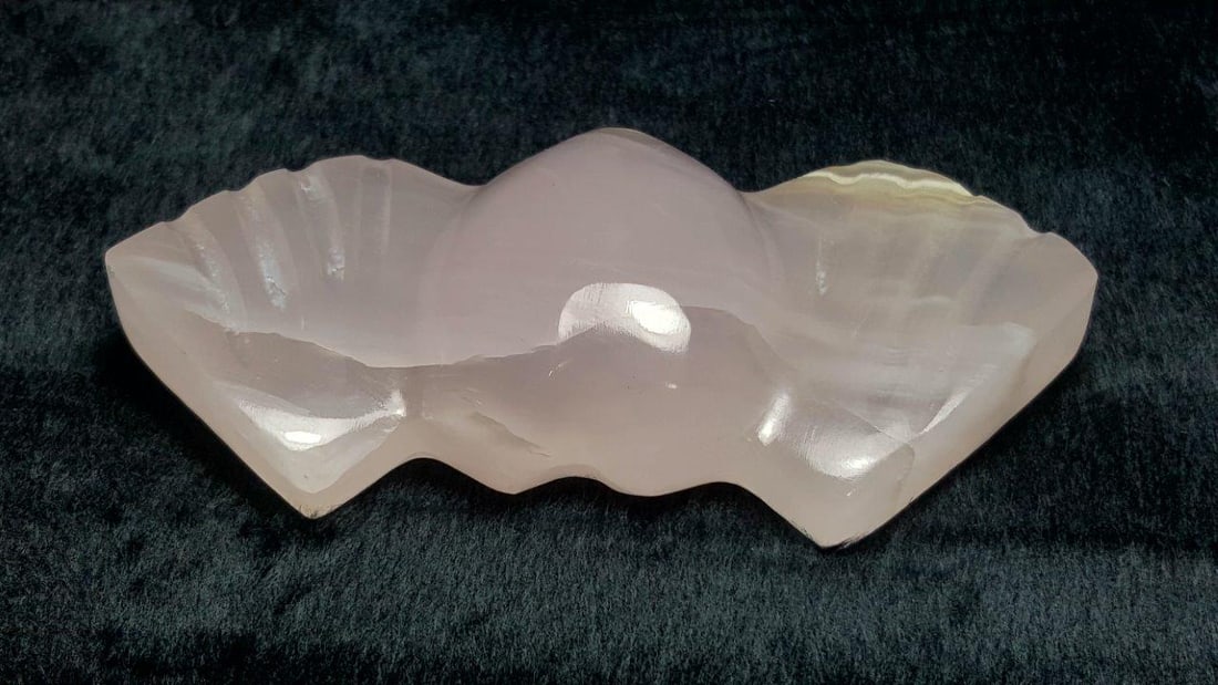 Baby Pink Calcite Wings: Baby Pink Calcite Wings Shipping: $23.00. Shipping rates are determined by Parcel weight and destination.