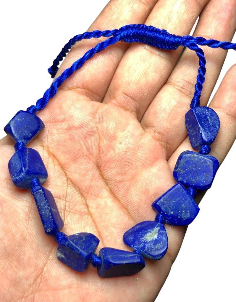 Raw Lapis Lazuli Beaded Bracelet: Raw Lapis Lazuli Beaded Bracelet Shipping: $23.00. Shipping rates are determined by Parcel weight and destination.