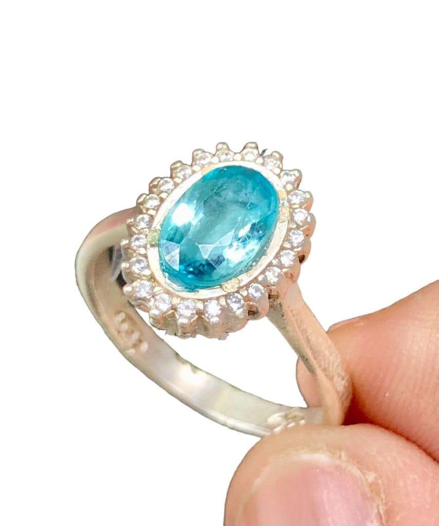 Blue Zircon Ring in Silver: Blue Zircon Ring in SilverStone Weight: 3.5 Carats Ring Size: 7.5 US (Adjustable) Silver: 3.5 Grams Choose design of your own and we will make it for youWe accept custom order in Sterling Silver,