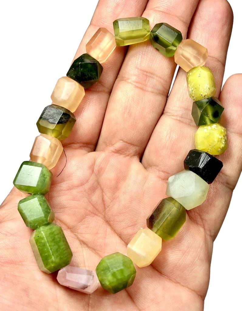 Hand Carved Mix Beaded Stones Bracelet: Hand Carved Mix Beaded Stones BraceletShipping Rate: $26.00 .shipping rates are determined by Parcel weight and destination.Combined shipping: We offer combine shipping on multiple items purchased to